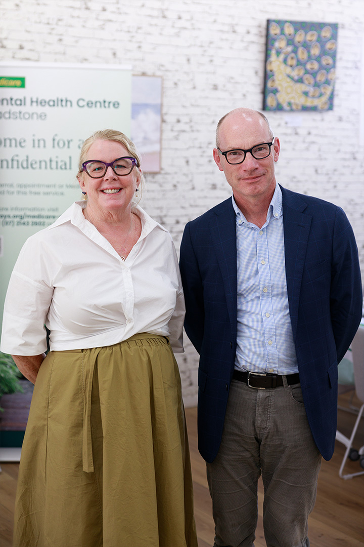 Laura Collister, CEO Wellways, and Dr Matthew Warden, Chief Medical Officer, Clarity Health Care pose for a photo together in the Rockhampton Medicare Mental Health Centre. 