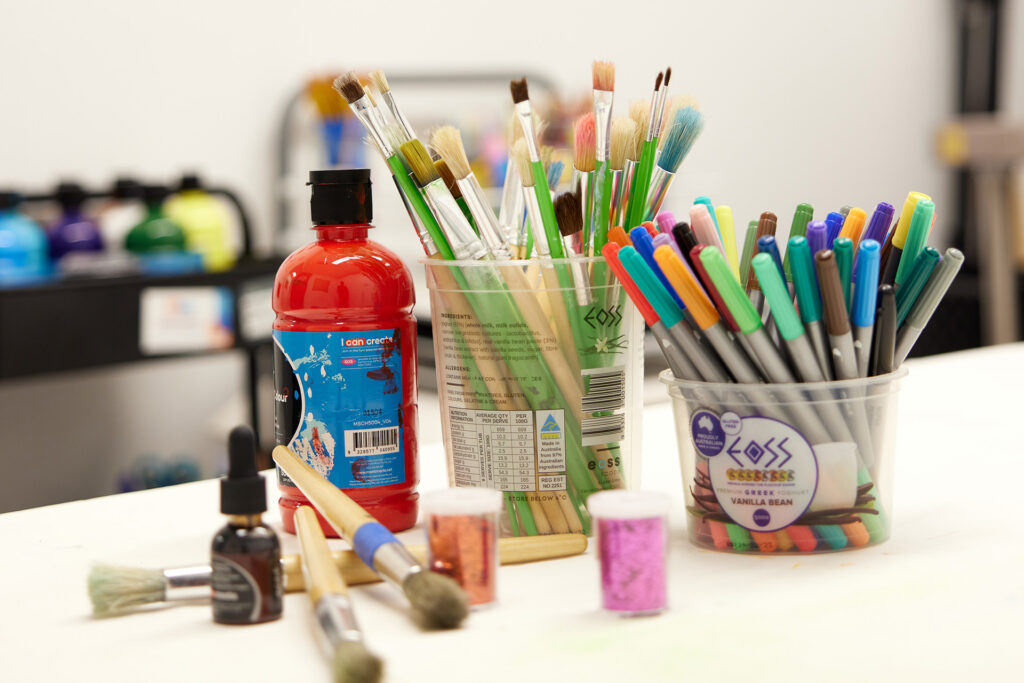 A selection of art supplies on a table